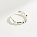 Lunar twist cuffs